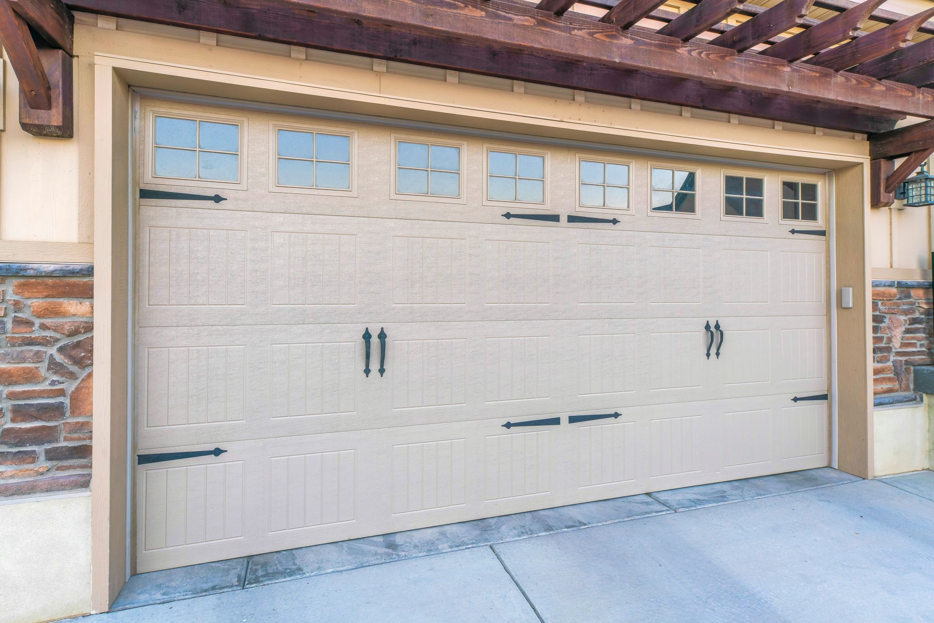 New Garage Door Installation, Modern garage door of a beautiful building on a sunny day